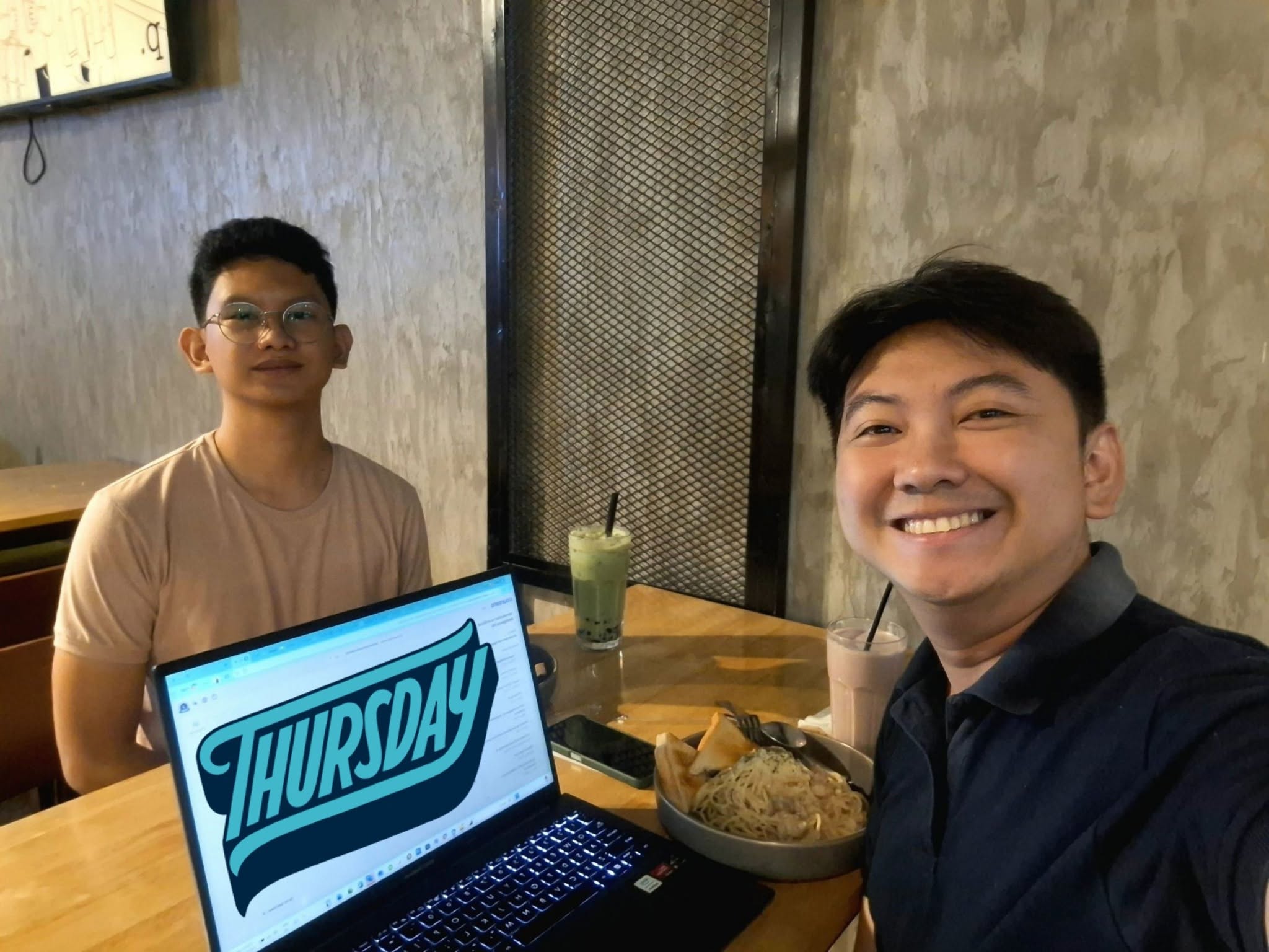 Jayson in a one-on-one mentoring session with a young professional over a laptop