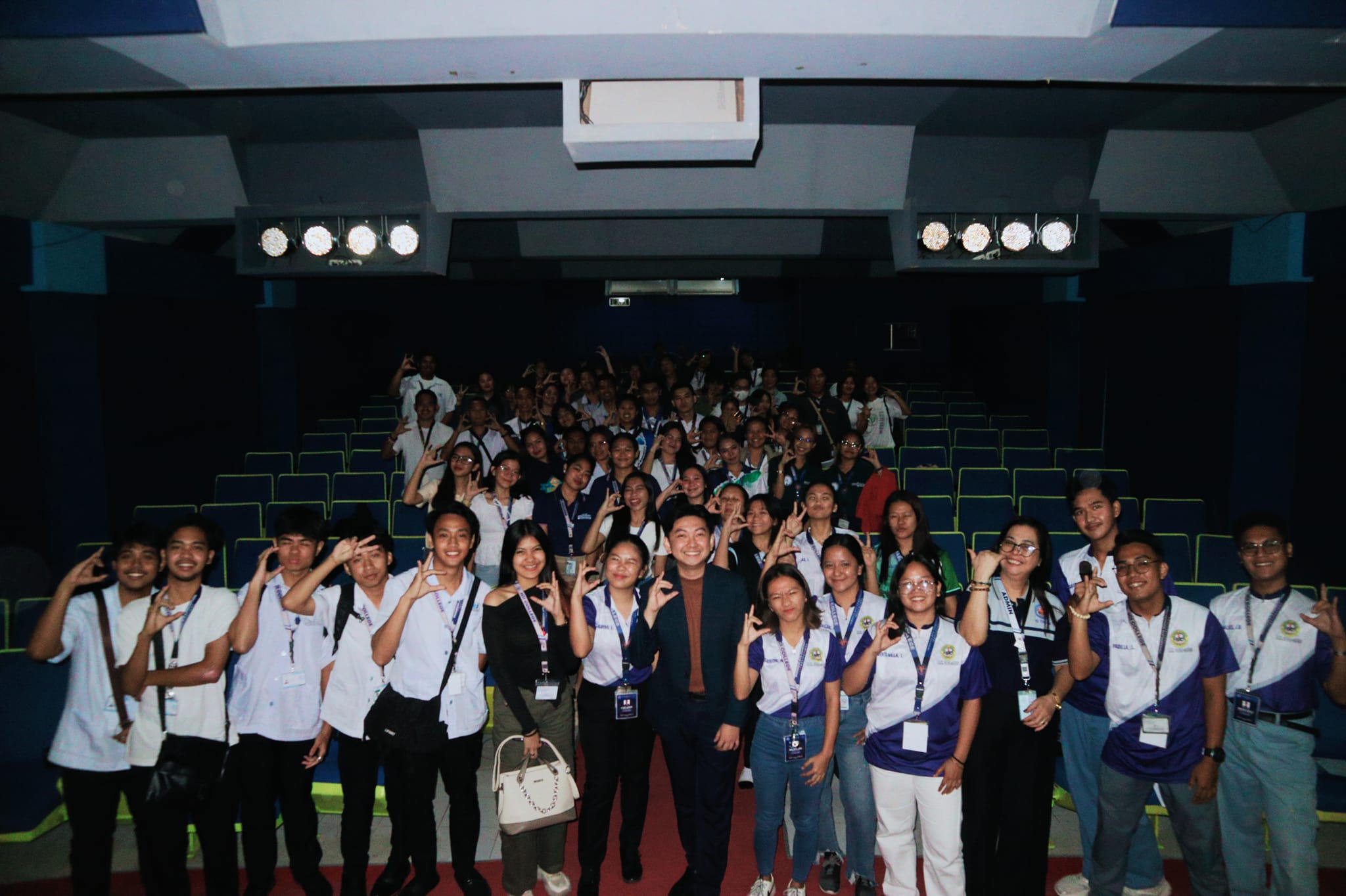 Group photo of Jayson with ICI College students filling the auditorium after the leadership seminar