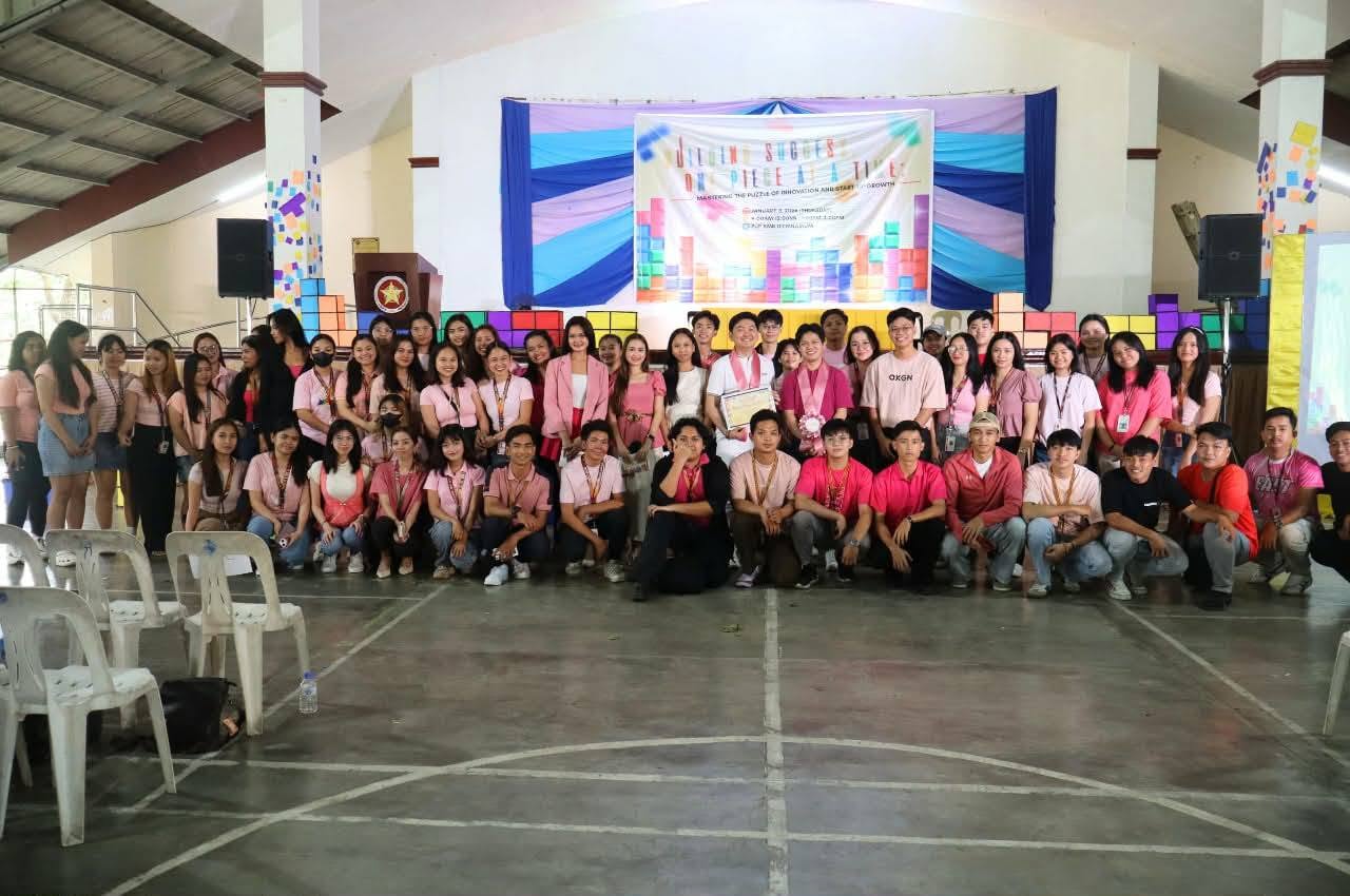Group photo of Jayson with 4th-year BS Entrepreneurship students in the PUP Sta. Maria gymnasium