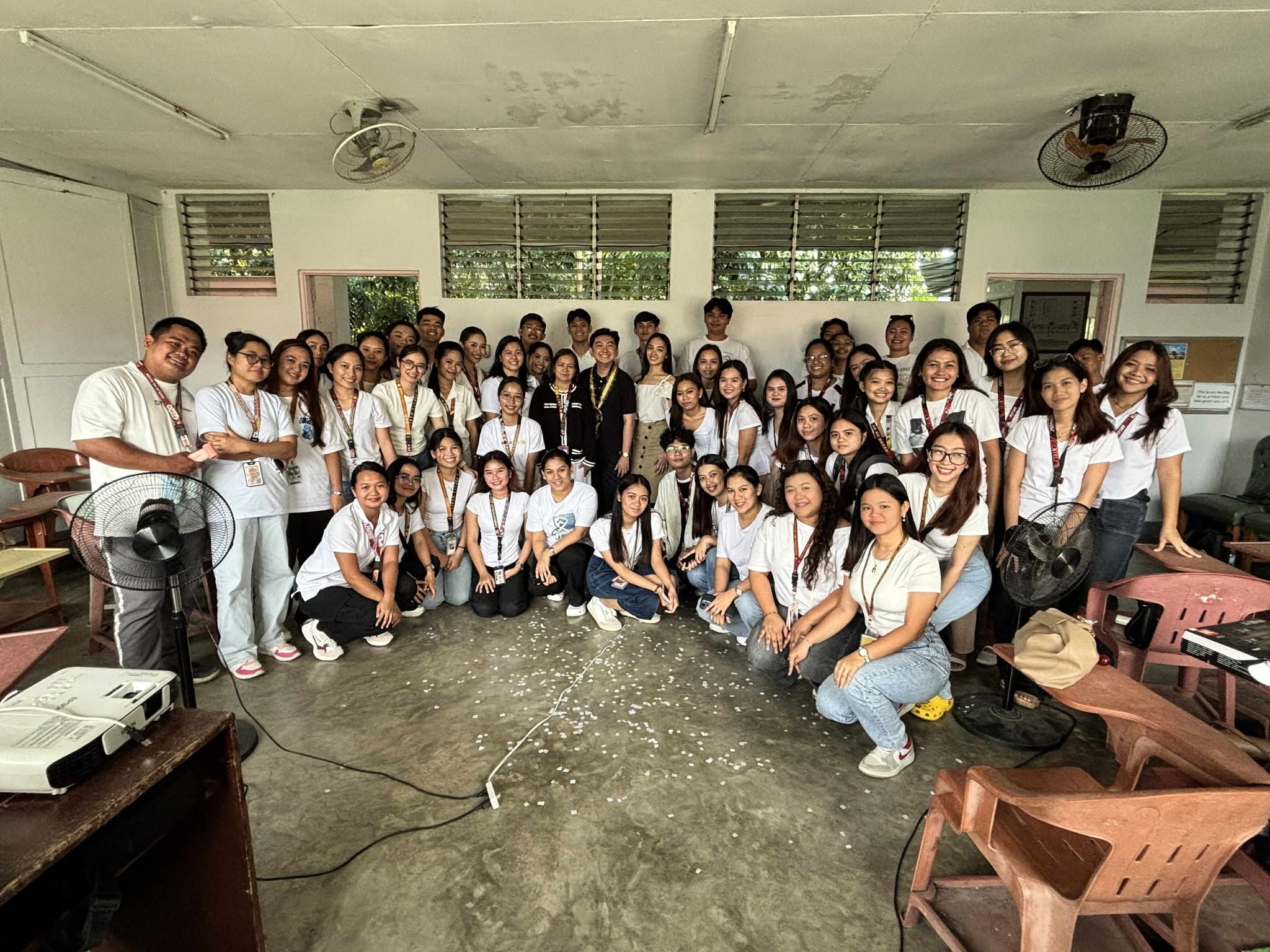 Jayson with faculty and a full classroom of PUP Santa Maria students after the talk